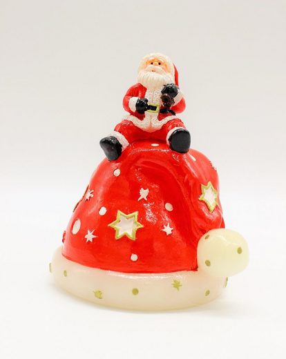 LED-Kerze LED Kerze "Weihnachtsmann auf Nikolausmütze"
