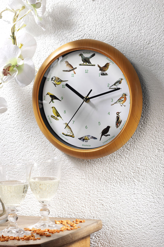 Wanduhr "Vogelstimmen", 25 cm Durchmesser, 12 heimische Vögel zur vollen Stunde.